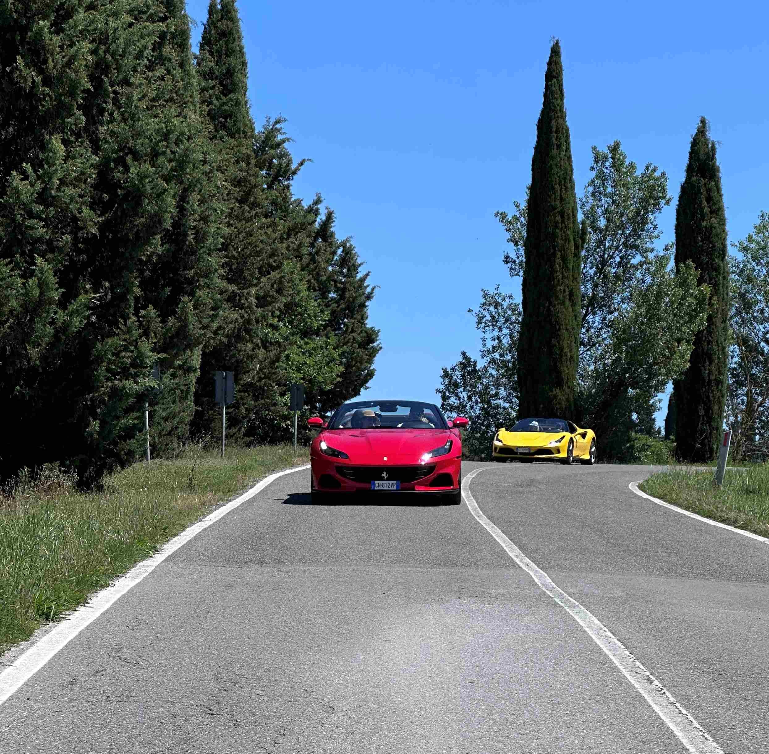 Ferrari Driving on Scenic Roads in Tuscany